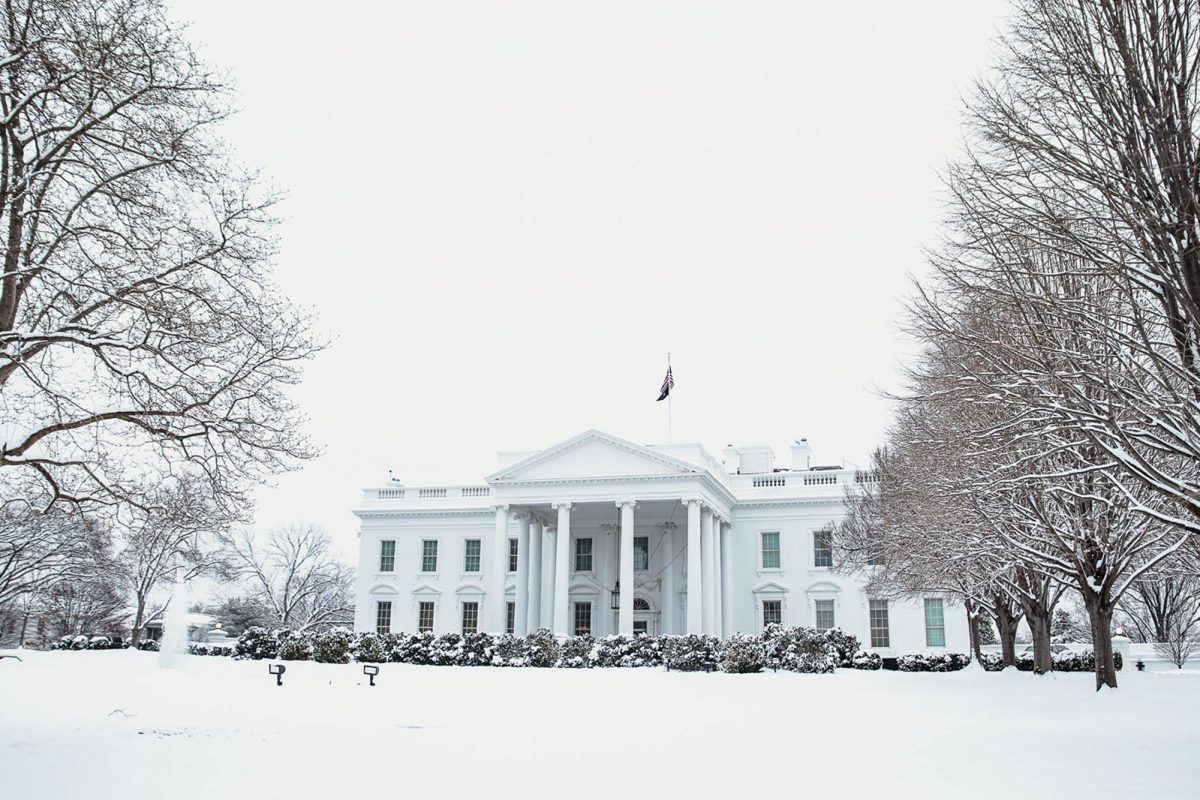 Snow blankets the White House lawn in January 2024.