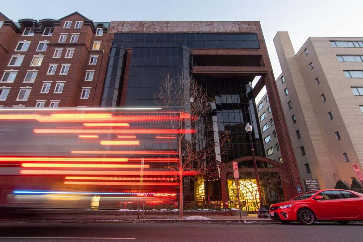 The lights of an ambulance rush past the entrance to the Washington Surgi-Clinic.