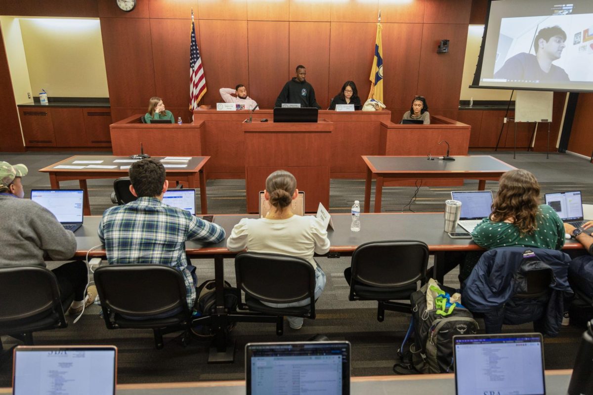 Student Bar Association Executive Vice President Nigel Walton speaks at a meeting in November.