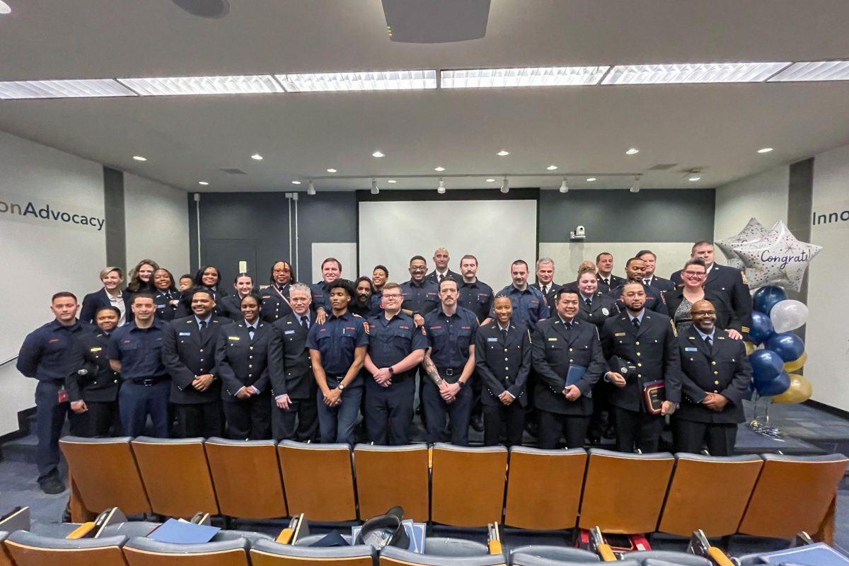 Members of the graduating paramedic class line up after a ceremony.