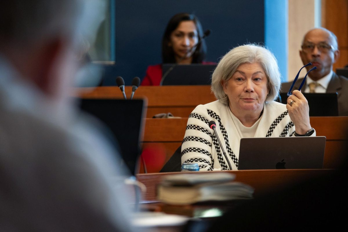 President Ellen Granberg listens during the Faculty Senate meeting.