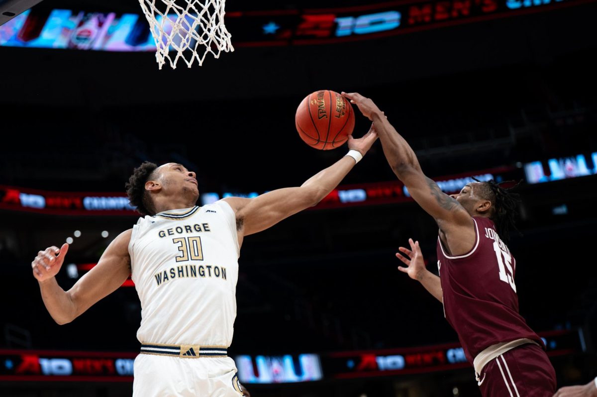 Redshirt senior forward Rafael Castro — who the conference selected to the Preseason All-Conference First Team — grabs the ball during the Atlantic 10 Championships last year. 