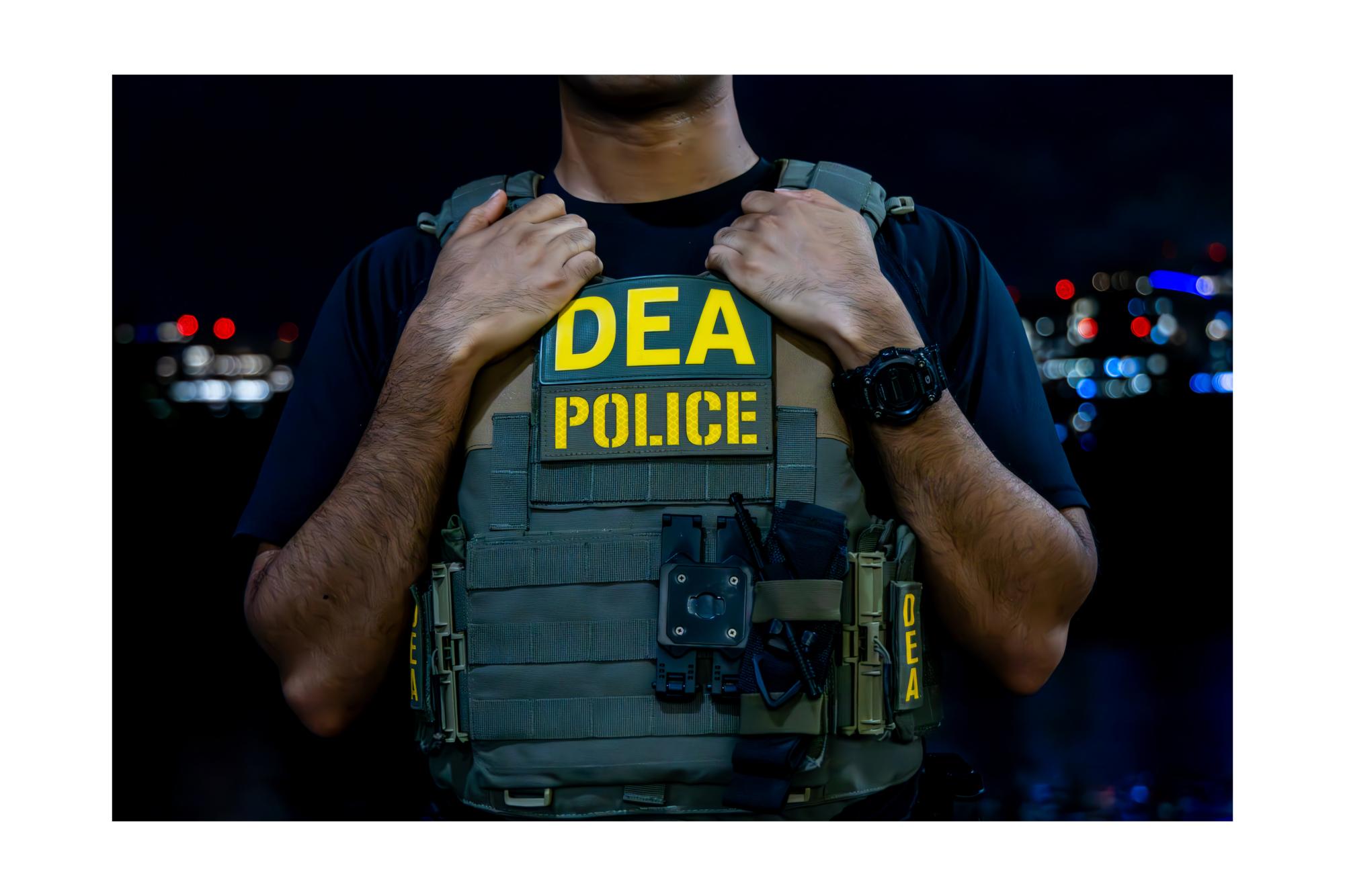 A DEA Special Agent patrols in Washington Harbour on Wednesday.
