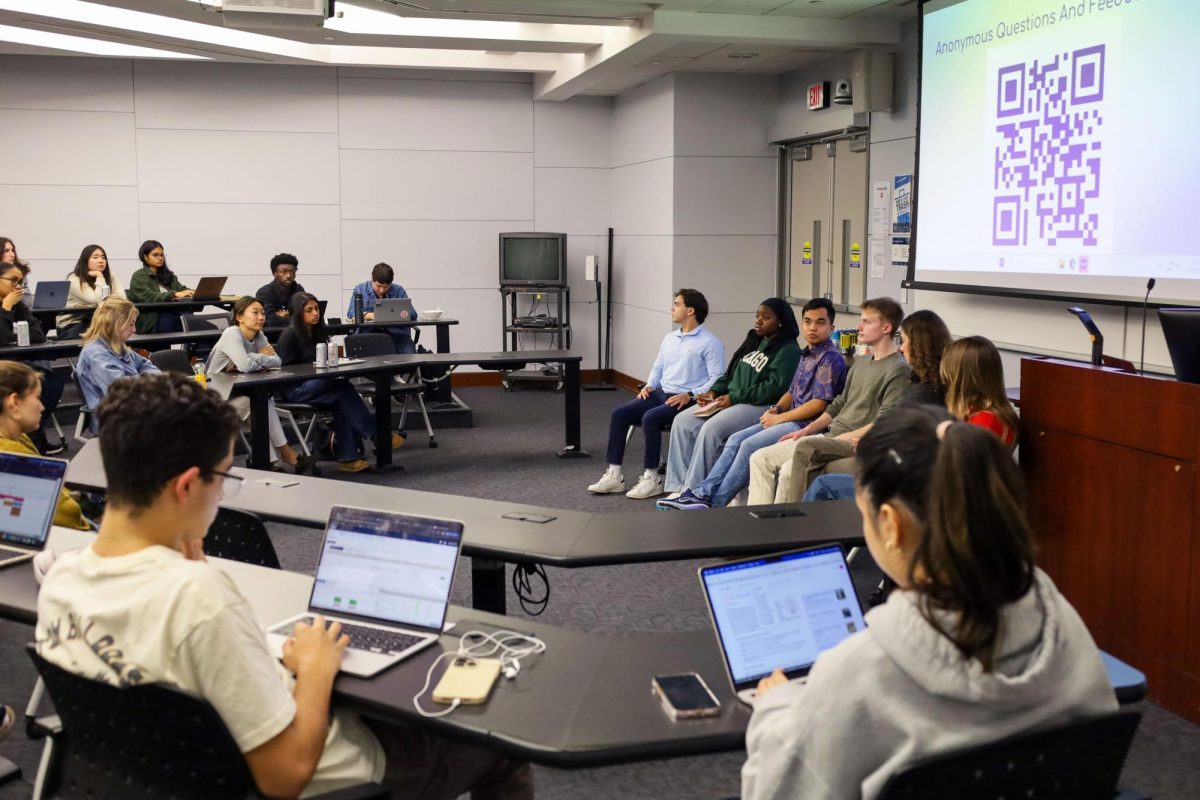 Student Government Association senators sit on a panel Wednesday.
