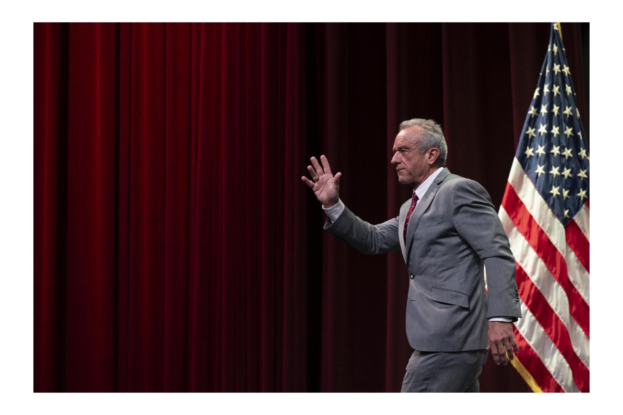Secretary of Health and Human Services Robert F. Kennedy Jr. walks on stage during a talk at Lisner Auditorium on Monday.