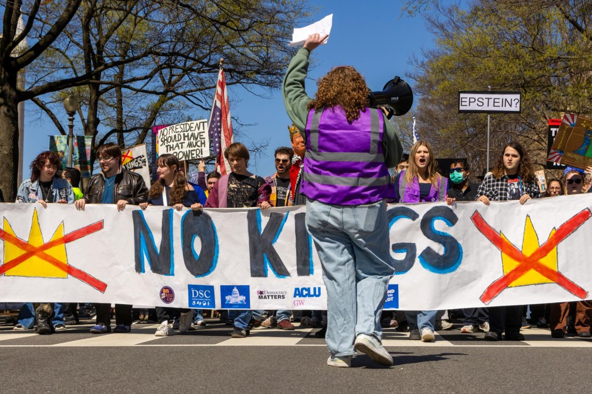 GW student representatives lead a "No Kings" rally on Saturday.