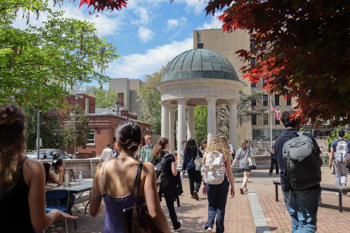 Students walk through Kogan Plaza in April. 
