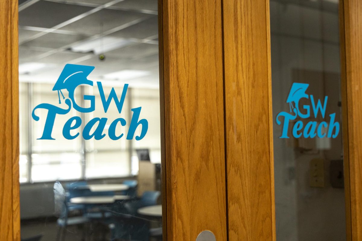 The GW Teach logo on classroom doors in Tompkins Hall. 