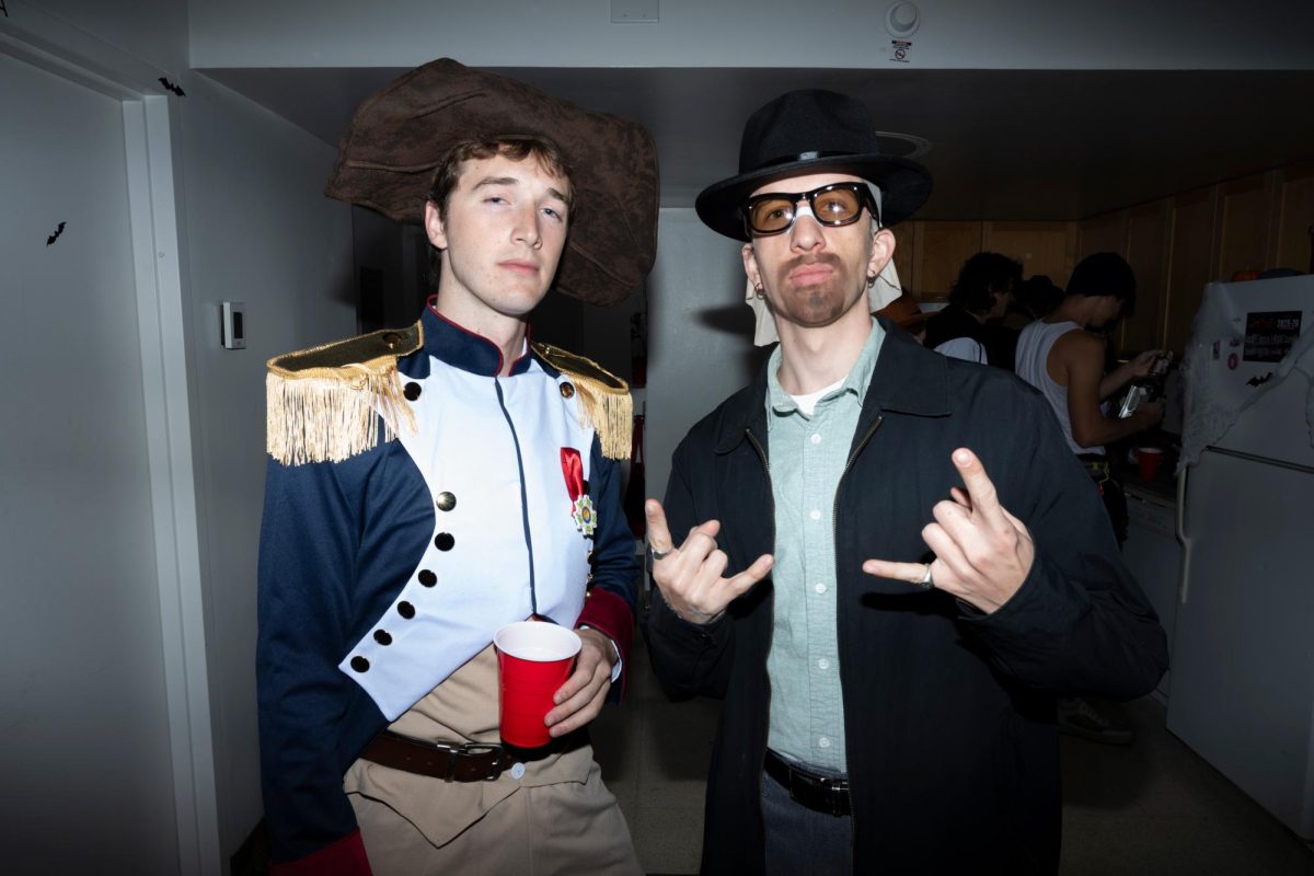 Students pose for a photo during a Halloween party at Shenkman Hall this past fall.