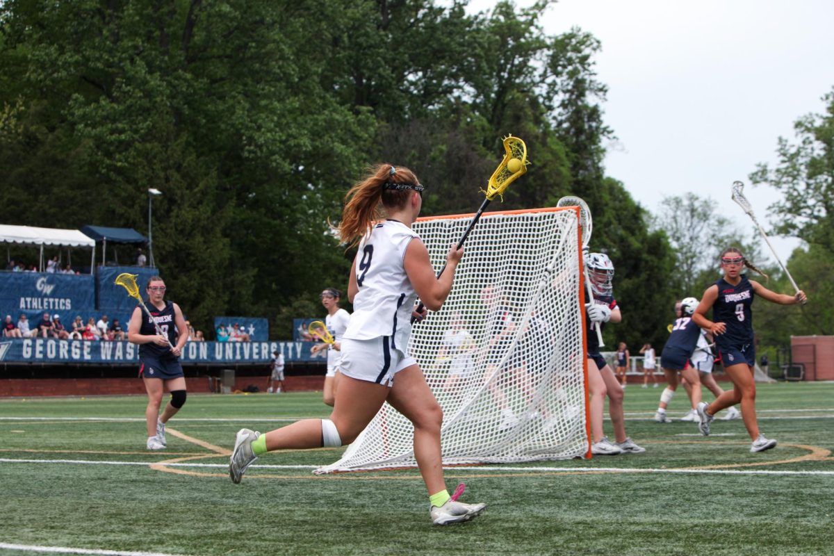 Freshman attacker Mia Milkowski moves the ball during a game against Duquesne on Saturday. 