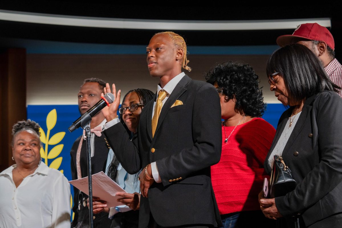 Student Government Association President M.J. Childs getting sworn in at the inauguration ceremony Friday.