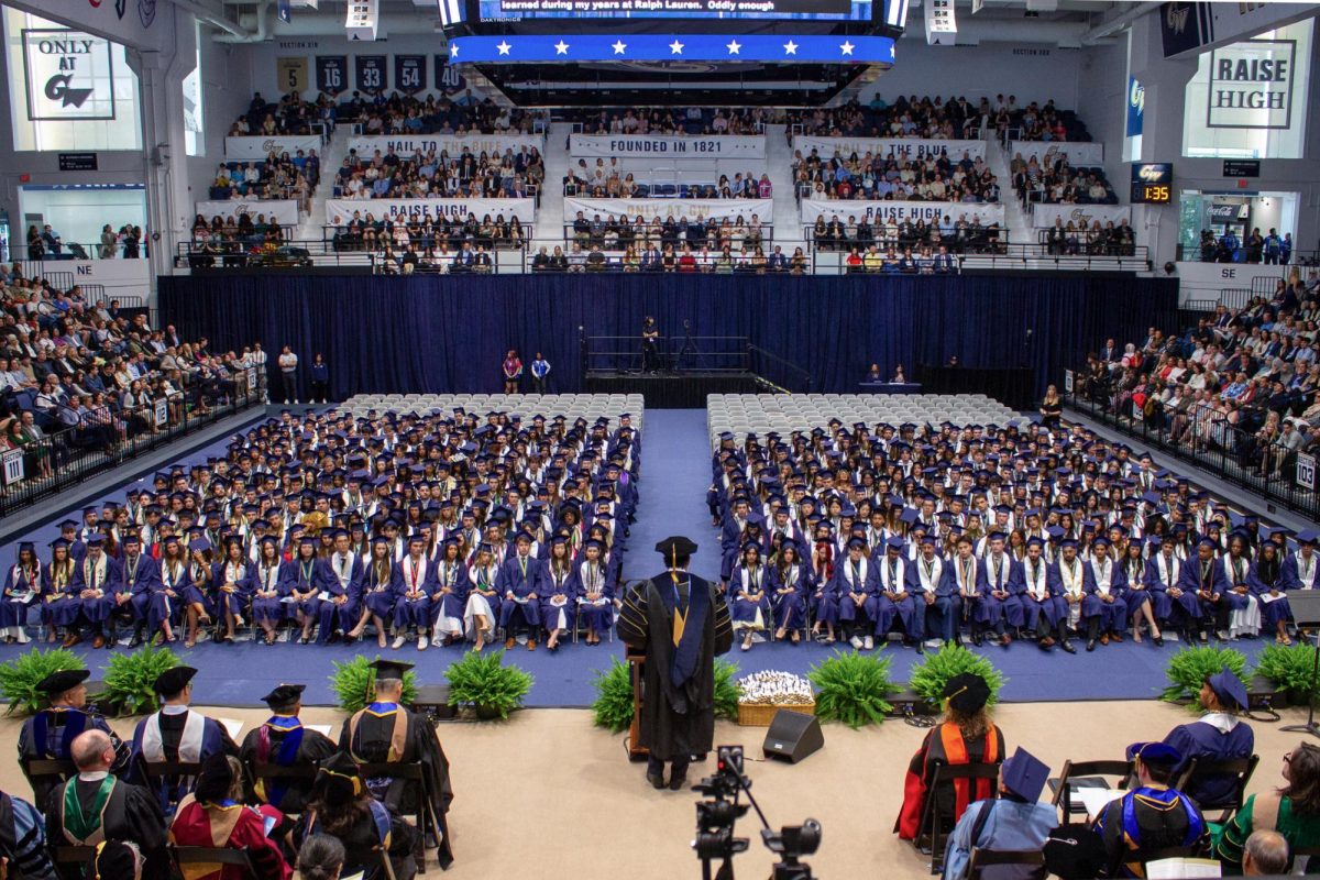 Students sit during a graduation ceremony. 