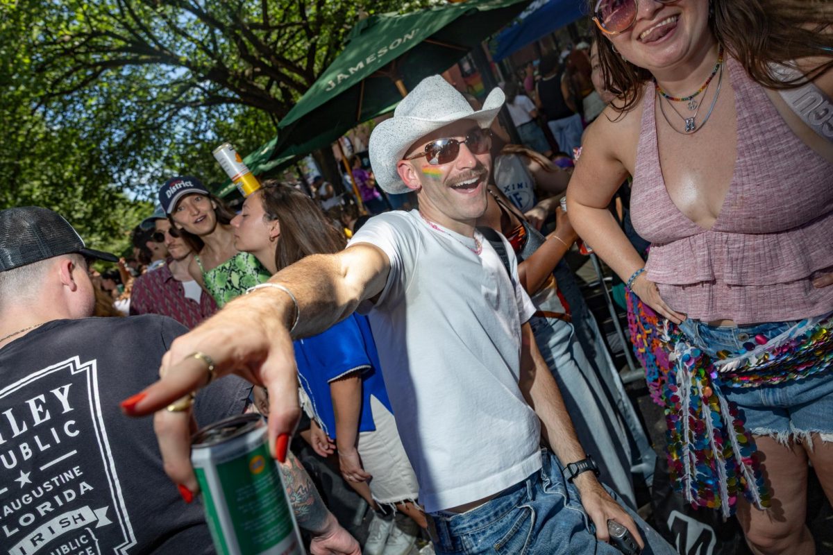 Eventgoers line the streets at the Capital Pride 17th Street Block Party in Dupont Circle Saturday.