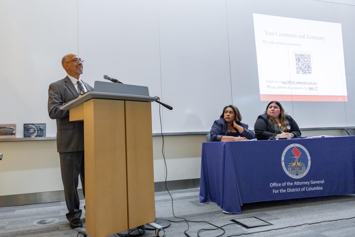 GW’s Outgoing Vice President and General Counsel Charles Barber speaks at a public hearing hosted by the Office of the Attorney General for the District of Columbia on Thursday. 